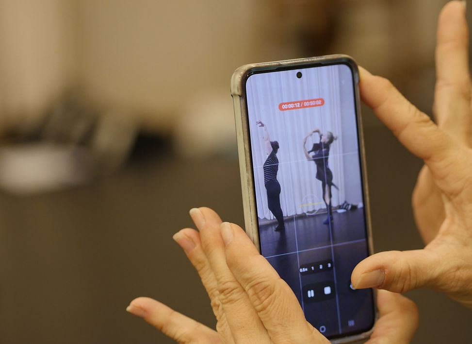 Performing arts students exploring embodied digital strategy through movement, documentation, and rehearsal practice