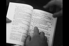 Close-up of script reading and dramaturgical analysis in theatre directing training