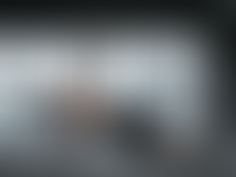 A muscular man in a side plank