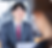 スーツ姿の男性が笑顔で会話する様子。ビジネスシーン、面接の場面。ECMSジャパン