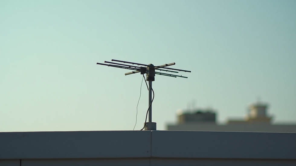 Close-up view of a TV antenna mounted on a rooftop