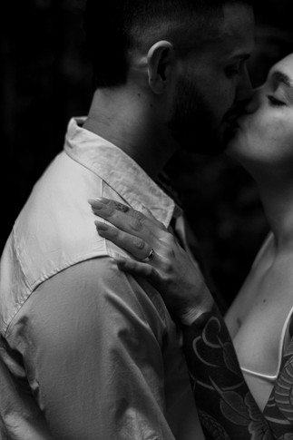 black and white photo of two engaged lovers