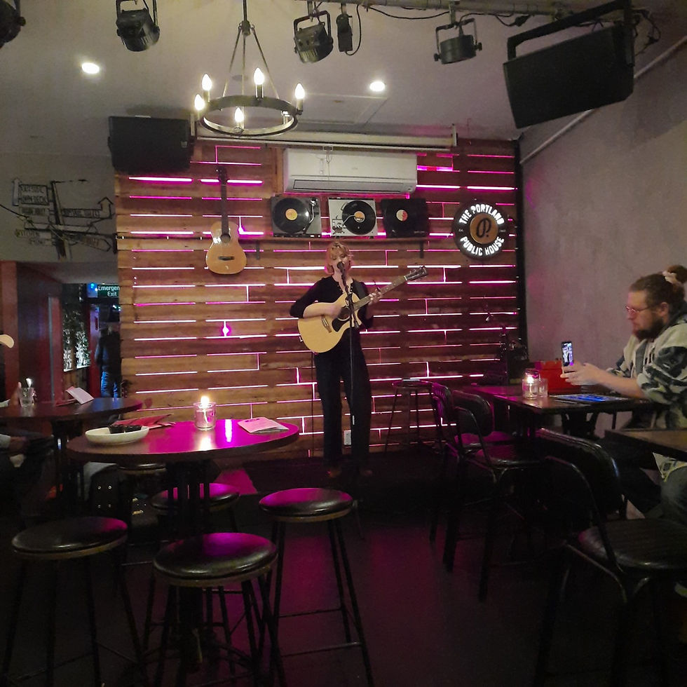 Eden Hawkins playing original songs at Portland Public House