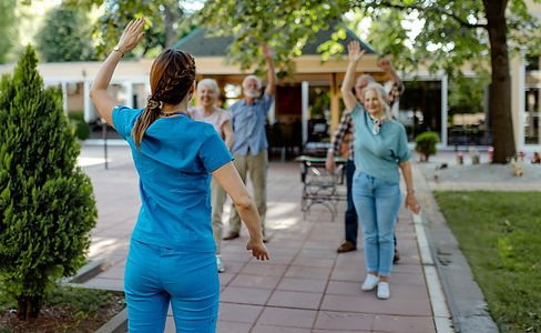outdoor activity with nurse and seniors