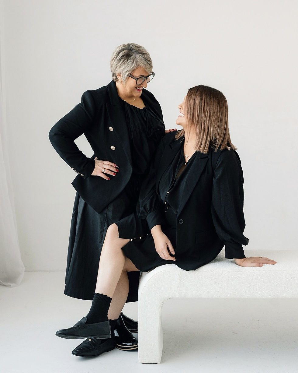 Veronica Jayne co-owners Stylists Jayne and Aimee looking at each other adoringly. 