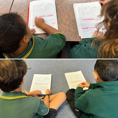 Classroom students reading. DIFFIT texts are glued into their Literacy Book