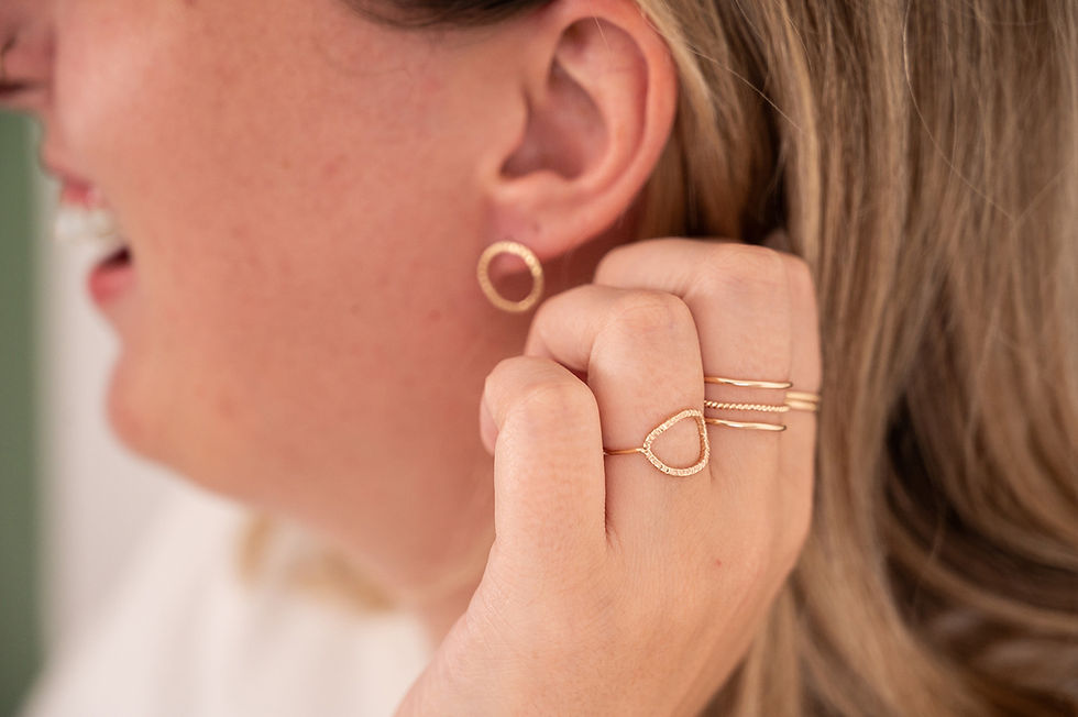 woman wearing handmade goldfilled jewelry