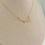 Thumbnail: gold tulip necklace on bust