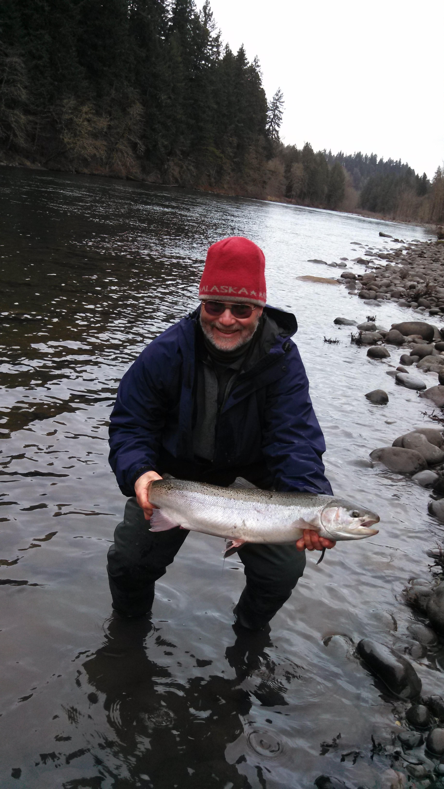 older man with fish in river.jpg
