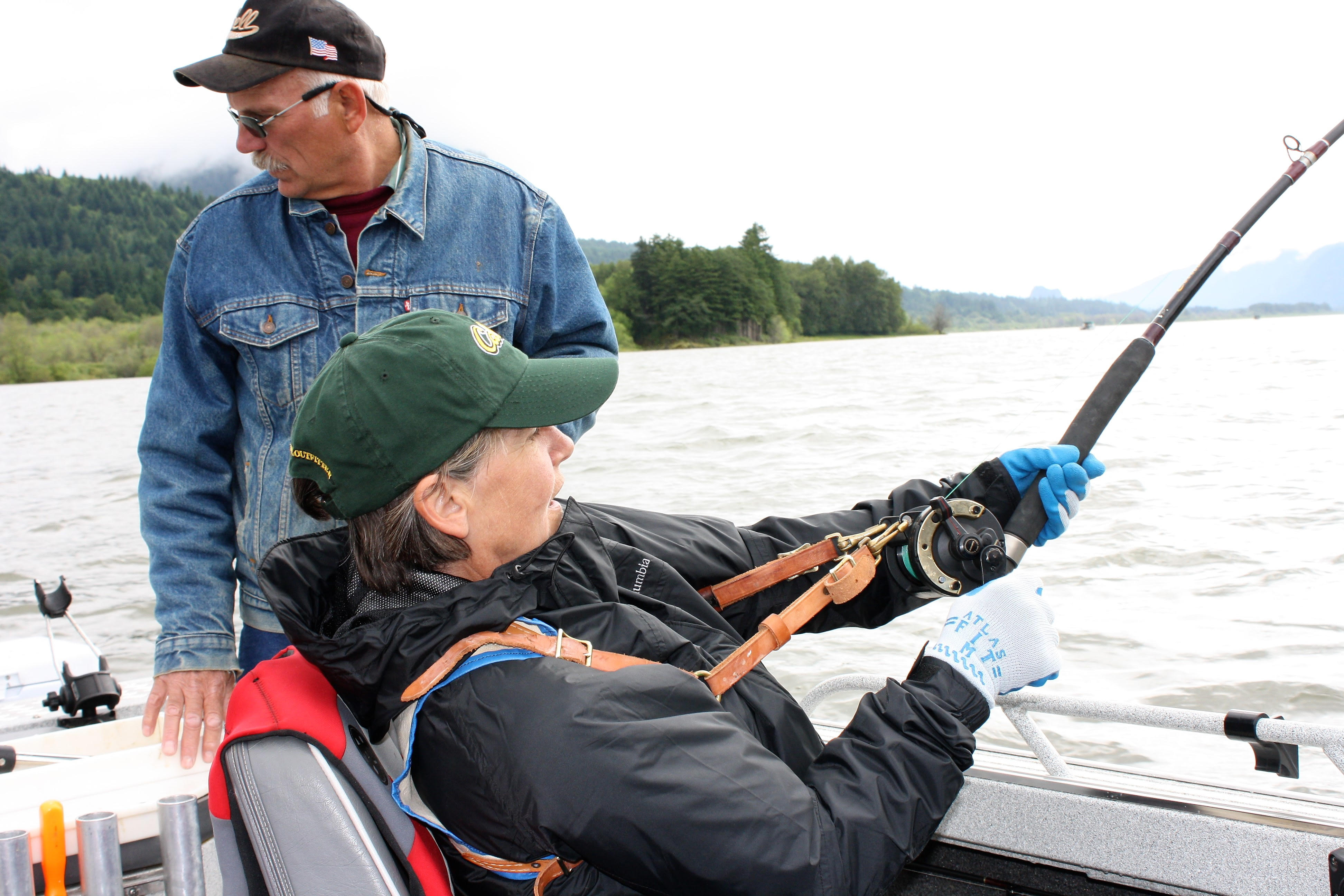 Lana with her sturgeon on the line.jpg
