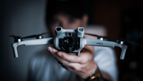 man holding a dji drone