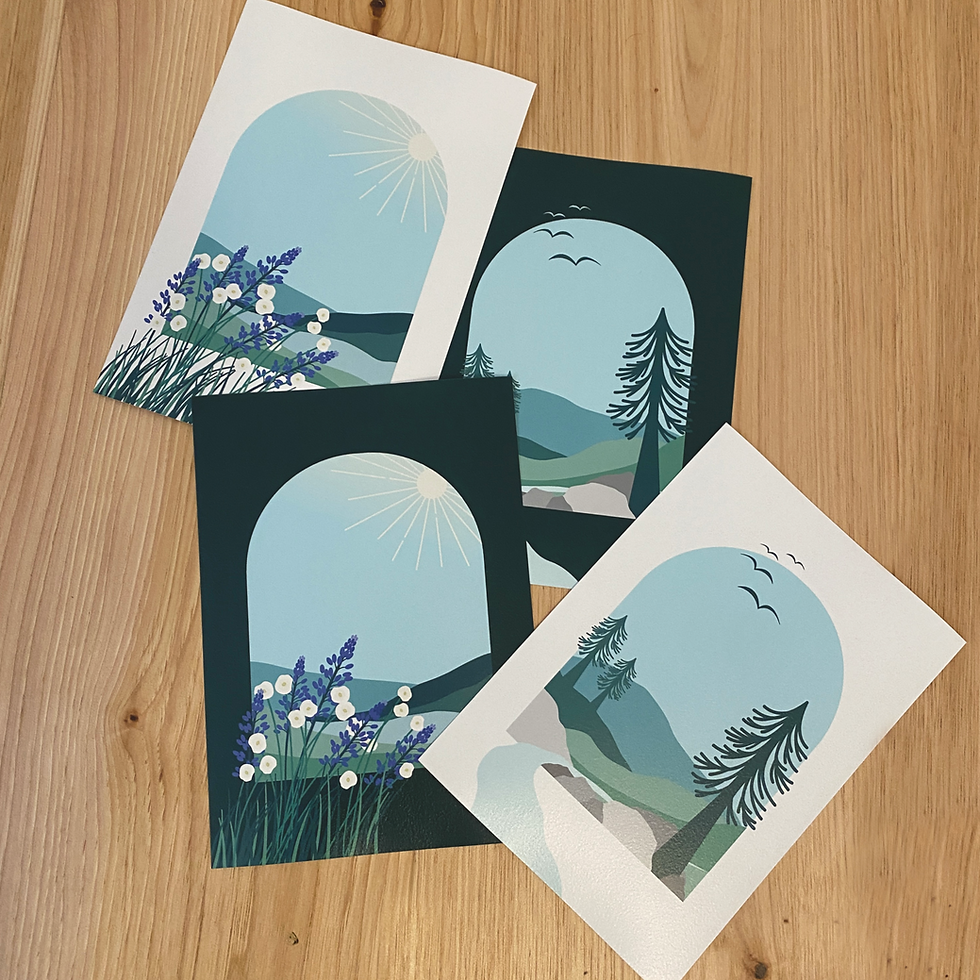 Thumbnail: four art prints featuring a dark teal background  some have a white background and an arch shape filled with mountain and wildflower scenery a digital art illustration not ai generated. scattered on a hardwood background.