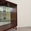 Thumbnail: Mid-Century display cabinet with mirrored back, two glass shelves/doors