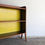 Thumbnail: Mid-Century solid Sapele bookshelf with yellow backing