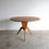 Thumbnail: Mid-Century round oak dining room table