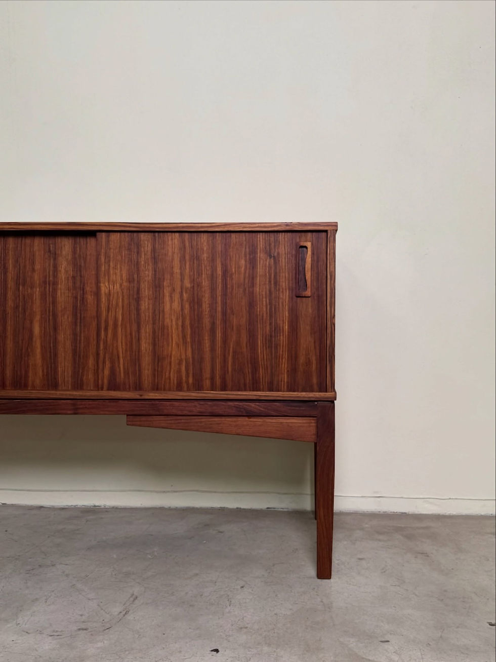 Thumbnail: Mid-century kiaat sideboard with three drawers and two sliding doors