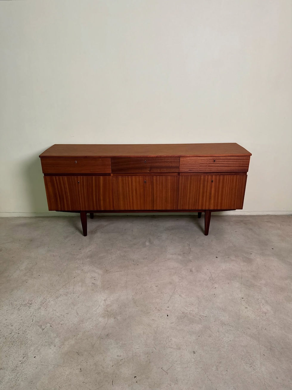 Thumbnail: Mid-century sapele sideboard with drop down storage cabinets