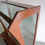 Thumbnail: Mid-Century sapele curved glass display cabinet with solid brass feet.