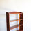 Thumbnail: Teak Bookshelf with 5 shelves and curved detail on upper shelf and feet