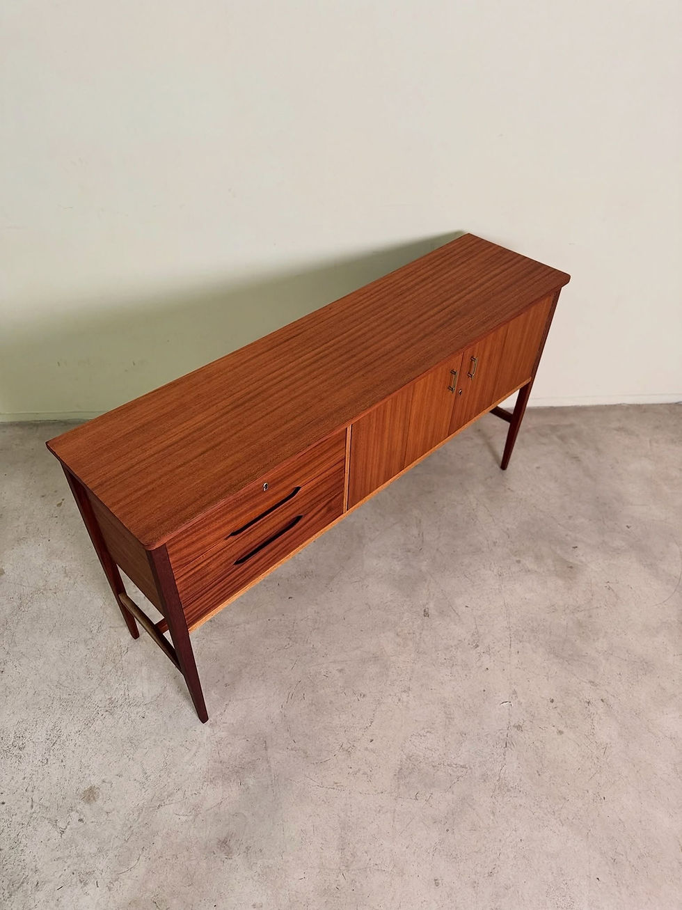 Thumbnail: Mid-century tall sideboard with three drawers and two cupboards
