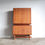 Thumbnail: Mid-Century Kiaat drop front drinks cabinet in the style of Kallenbach