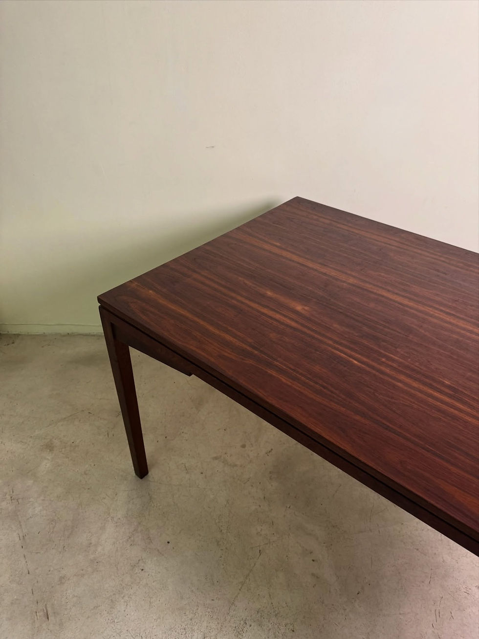 Thumbnail: Mid-century six seater dining table in rich dark grain with elegant tapered legs