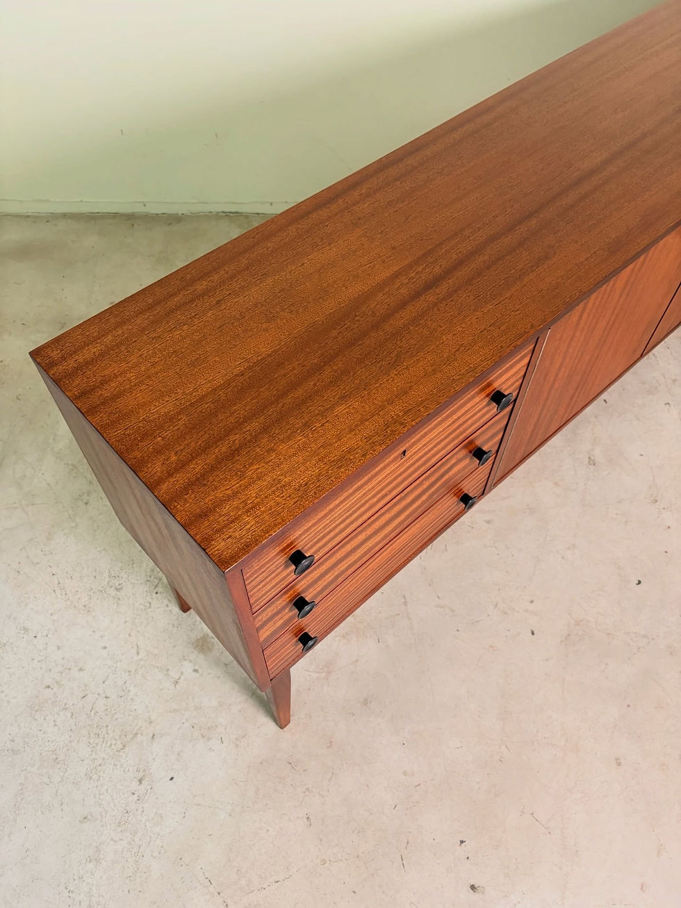 Thumbnail: Mid-Century long Novocraft sideboard with plenty of storage and mirror drop down