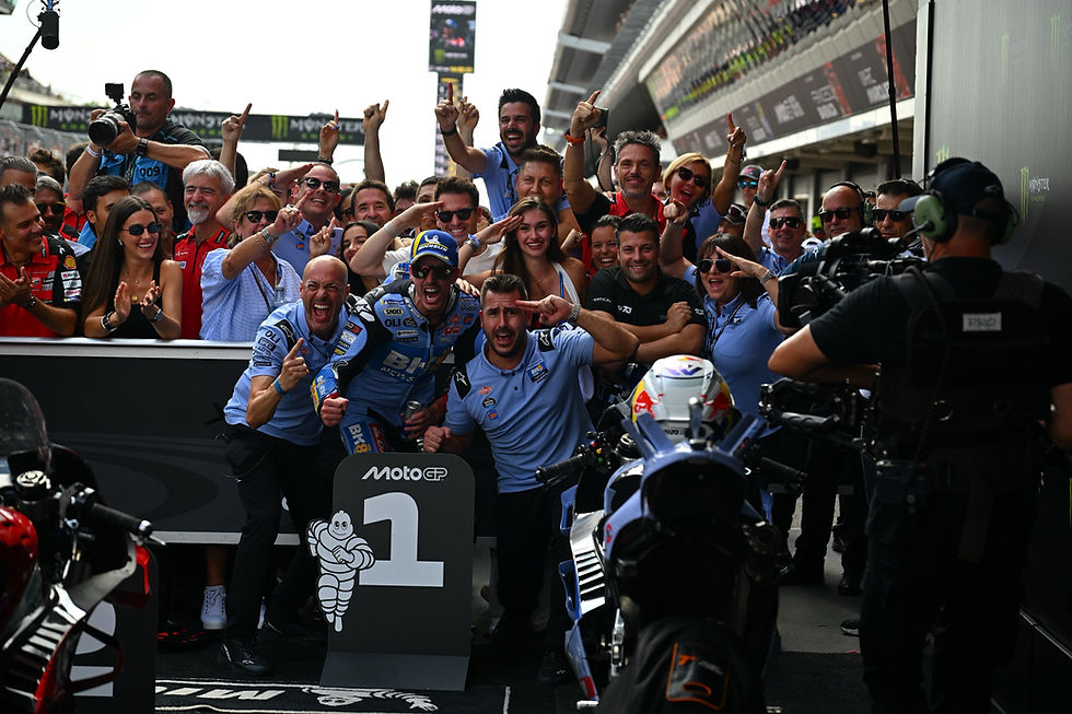 Álex Márquez fends off his brother to claim home glory
