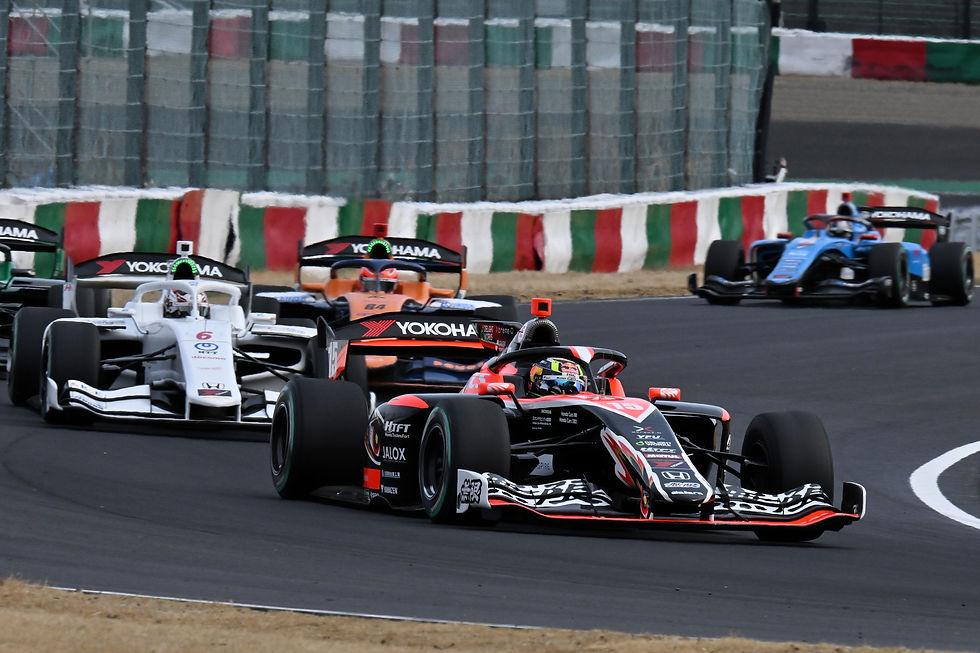 Iwasa leading Ohta (from last year's race at Suzuka) | Credit: Super Formula