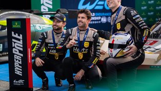 The No.12 Cadillac drivers: Will Stevens, Norman Nato, and Alex Lynn, celebrating their pole position at Fuji | Credit: Cadillac