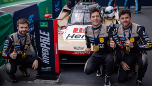 Credit: Cadillac Racing | The No.12 Cadillac drivers (L to R: Stevens, Lynn and Nato) in front of the Hyperpole sign and their Cadillac V-Series.R Hypercar.