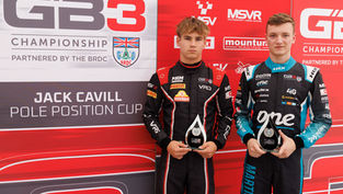GB3 Championship drivers Nikita Bedrin and Martin Molnar posing for a picture with trophies in their hands