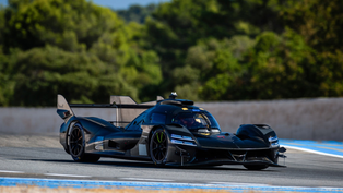 The GMR-001 appearing in bare carbon fibre takes to the track | Credit: Genesis Newsroom