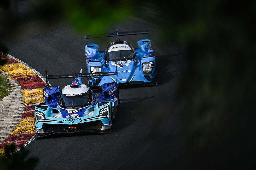 The No.60 blue Acura car leads the blue No.88 AF Corse Oreca 07 LMP2 | Credit: Acura Newsroom