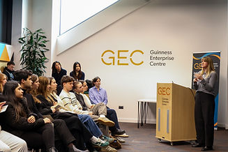 Jenny Huston speaking to a University
