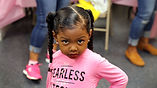 Moshelle Photo of Daughter in a Pink Tee Shirt.jpg