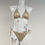 Thumbnail: Gold shimmer bikini with rainbow crystals M