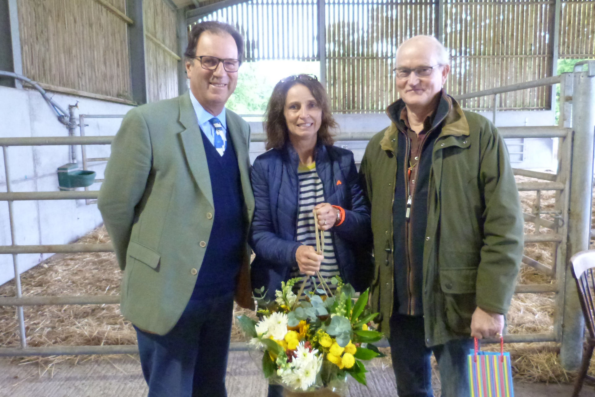 Henry Cator presents a token of thanks to hosts David and Stephie Trafford