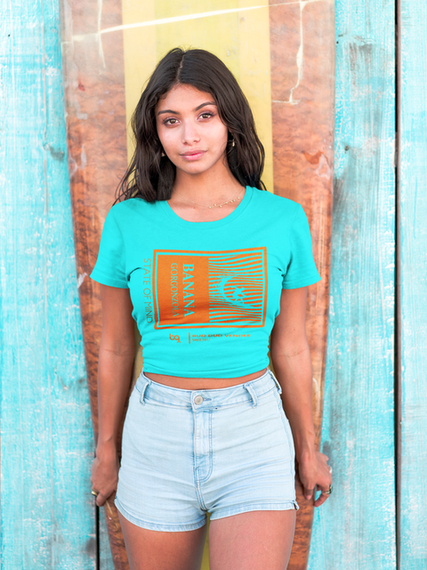hispanic-girl-wearing-a-tshirt-mockup-standing-against-a-surfboard-a18806.png