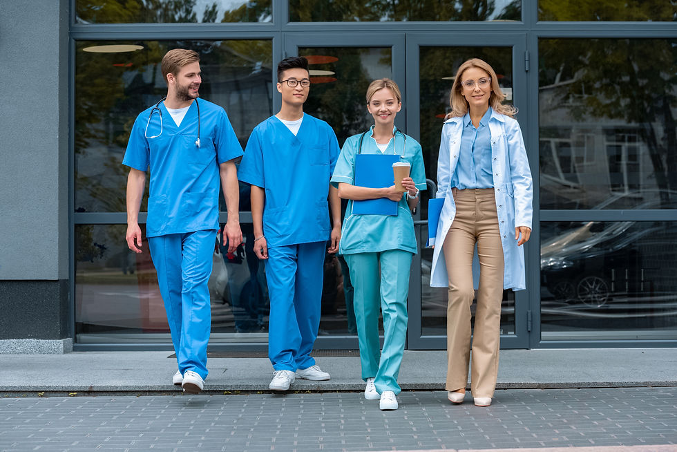 teacher-walking-with-multicultural-students-at-med-2023-11-27-05-35-02-utc.jpg
