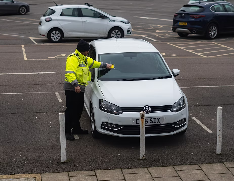person receiving a traffic ticket from officer in ontario