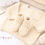 Thumbnail: Cream Baby Cardigan and Booties Gift Set