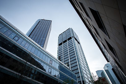 low-angle-shot-high-rise-buildings-clear-sky-frankfurt-germany.jpg