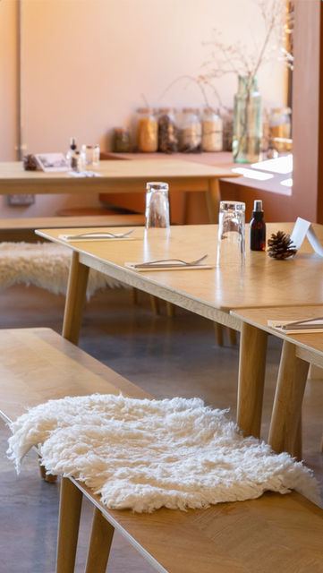 Close-up interior photography of wooden tables and cozy seating at Birchwood Restaurant, Sussex