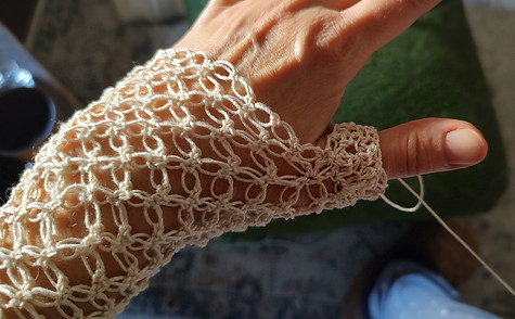 This is one of my hand cozies. She's a sexier version. Reminscent of the 80's but with an adult elegance. I had to incorporate different stitches to this style which is more typical of a shawl or wrap. Michele's Art & Apparel Pattern Stitching Page