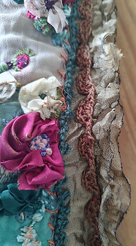 Why not add to the design/fabric with some dimensional elements?? Gorgeous ribbon flowers on the Hand Cozy would be a perfect idea to spruce up a plain but pretty wine bag. Michele's Art & Apparel