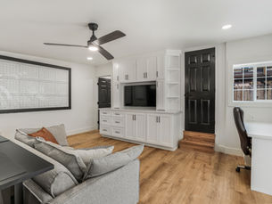 Home office with tv mount built into wall