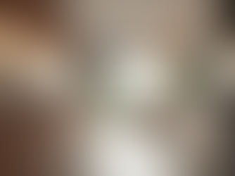 modern style kitchen with grey countertops and recessed lighting underneath the top cabinets