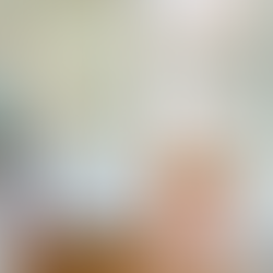 Entryway with storage cabinets and wood floors.