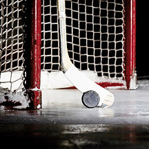 Palet de hockey et bâton